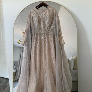 Elegant Beaded Gown in Beige and Silver